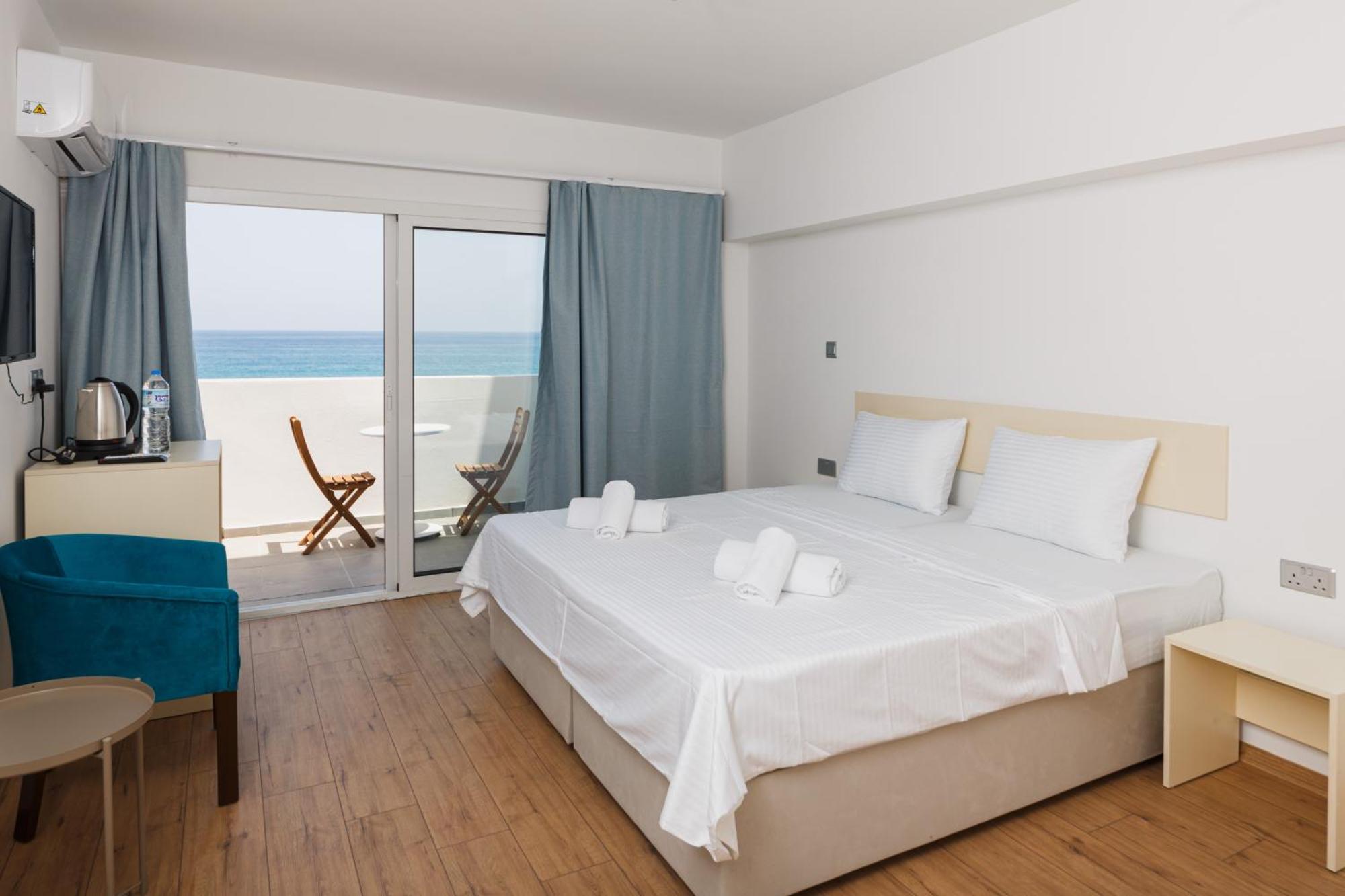 Hotel Azure Bay à Ayvaryara Extérieur photo